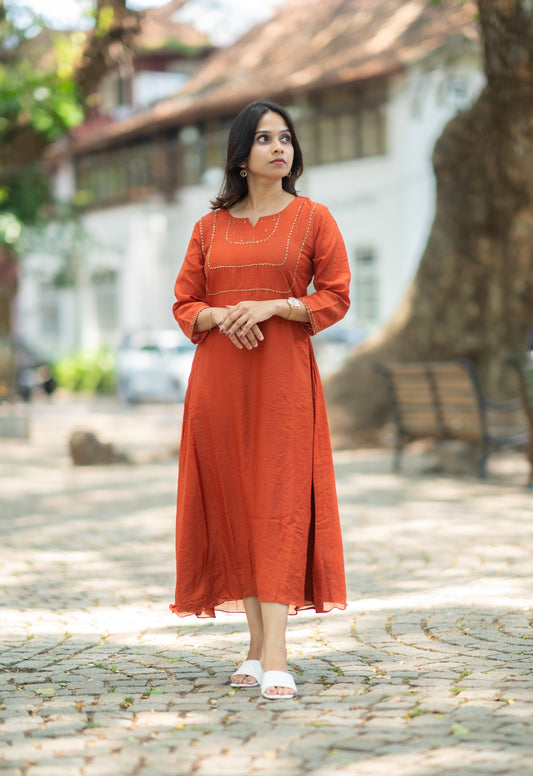 Rust orange shaded dola silk A-line kurti with handworked yoke and sleeve With santoon lining MBS-585