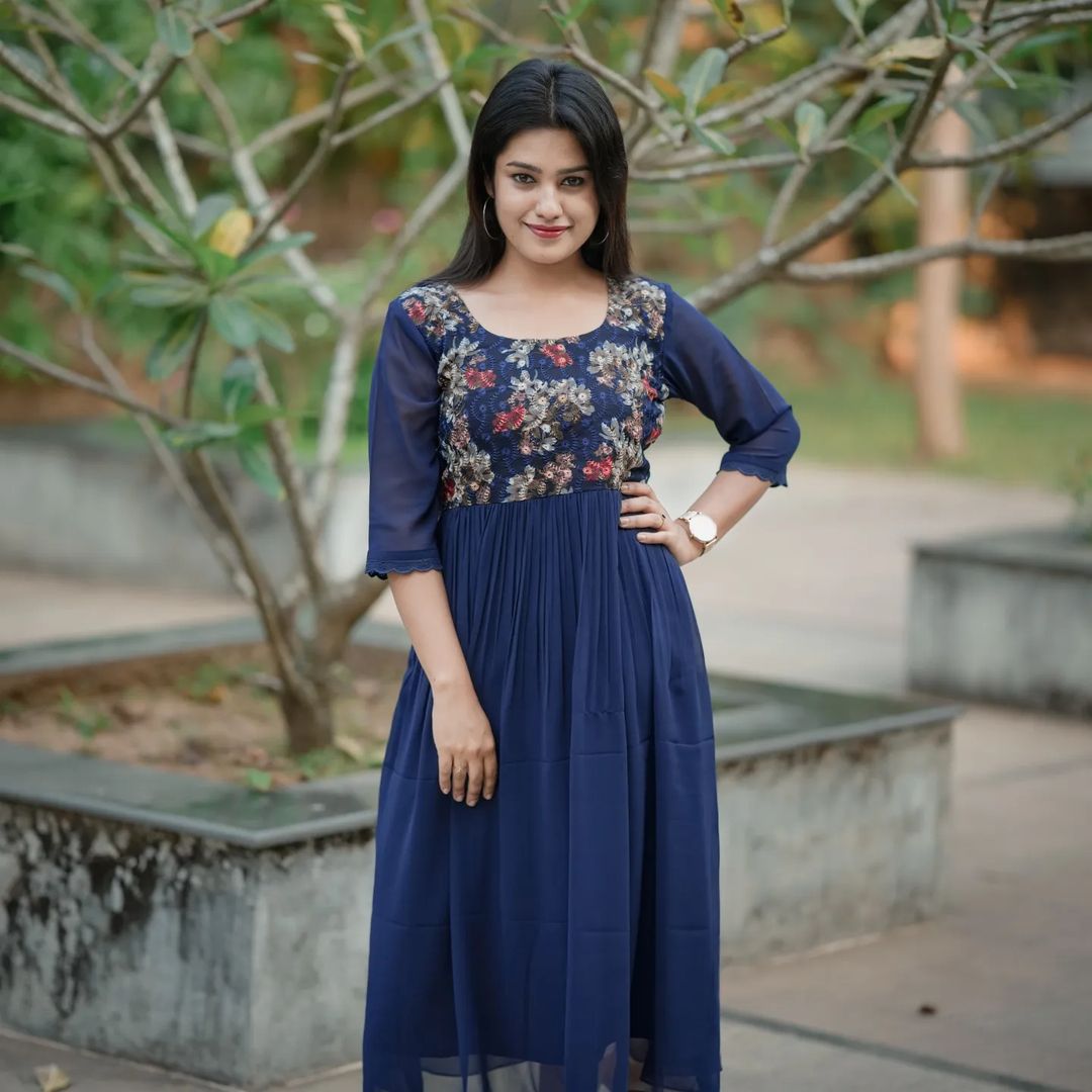Navy blue georgette A-line pleated kurti with thread embroidered yoke