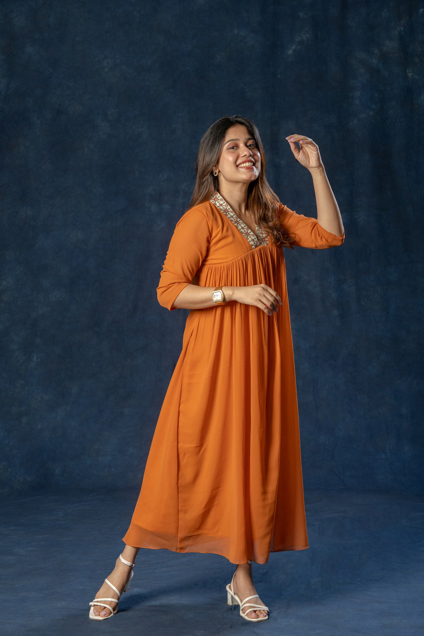 Alia cut A-line georgette kurti with thread worked collar in rust orange shade MBS-R188