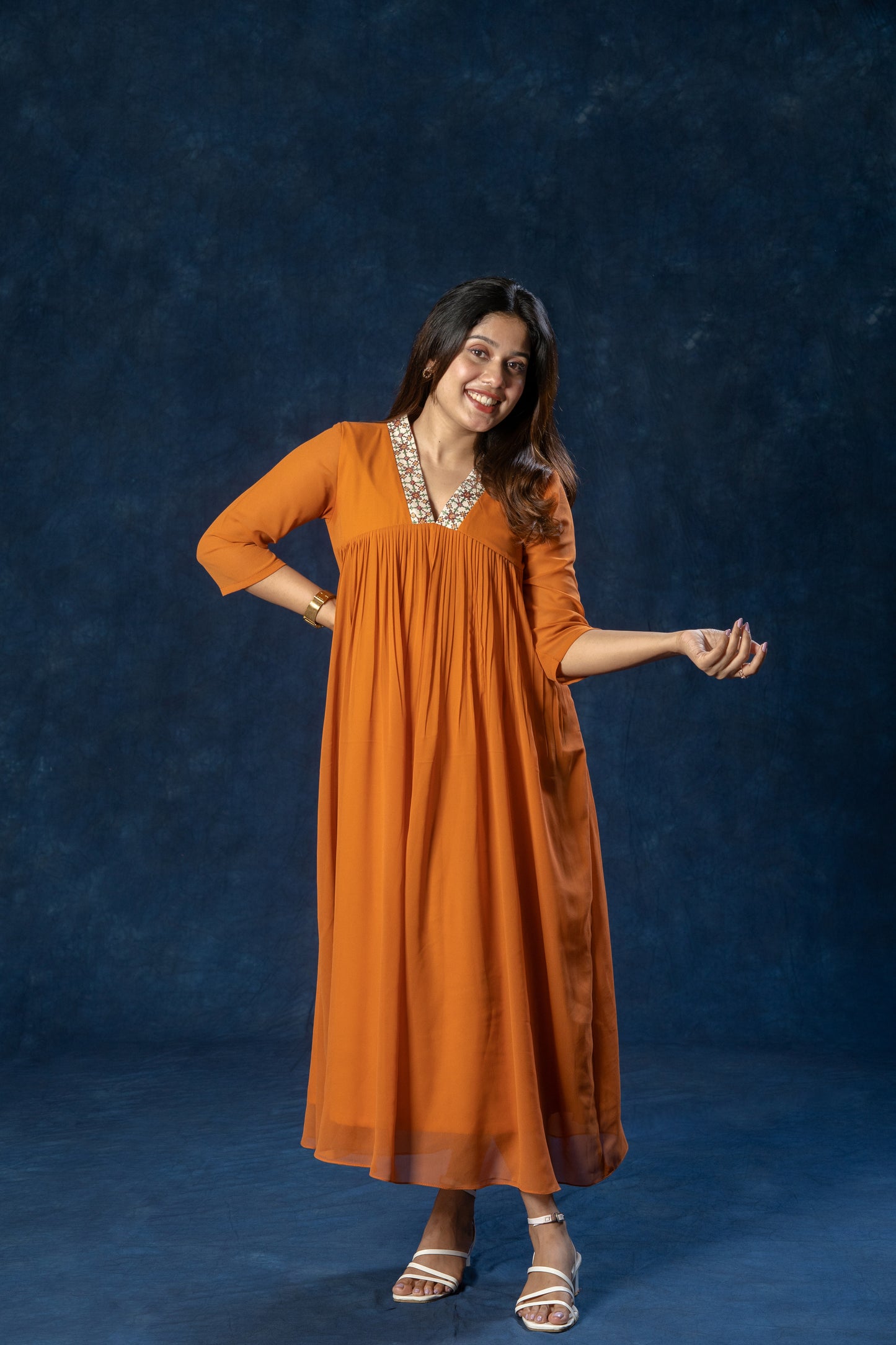 Alia cut A-line georgette kurti with thread worked collar in rust orange shade MBS-R188