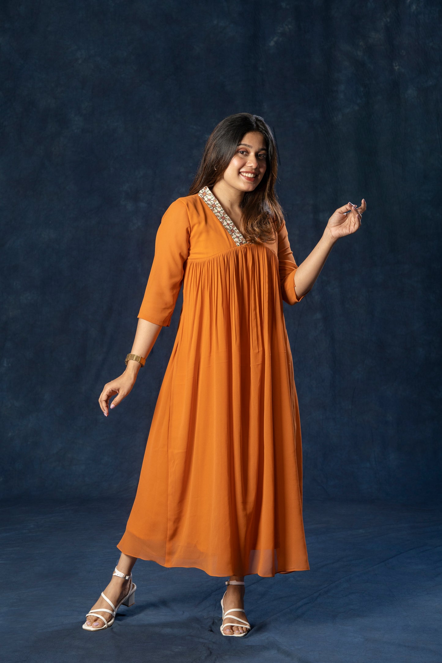 Alia cut A-line georgette kurti with thread worked collar in rust orange shade MBS-R188