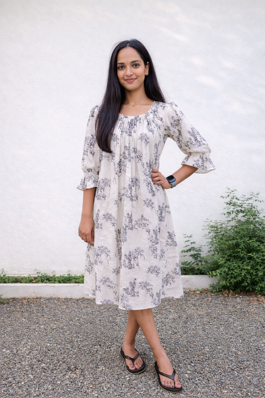 Floral Printed cambric cotton with all over sequins detailing A-line Kurti/dress in Ivory shade MBS-847