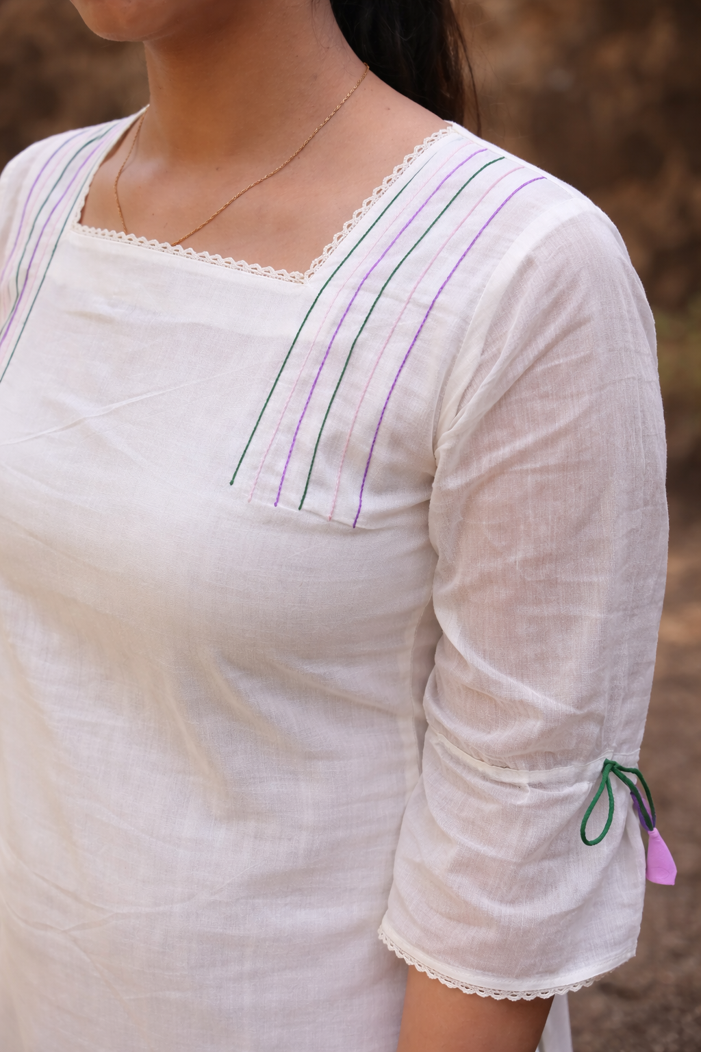 Off white mul chanderi A-line kurti/dress with single floral thread motif on hemline and anchor thread detailing on yoke MBS-849 **last piece sale** **Ready to dispatch**