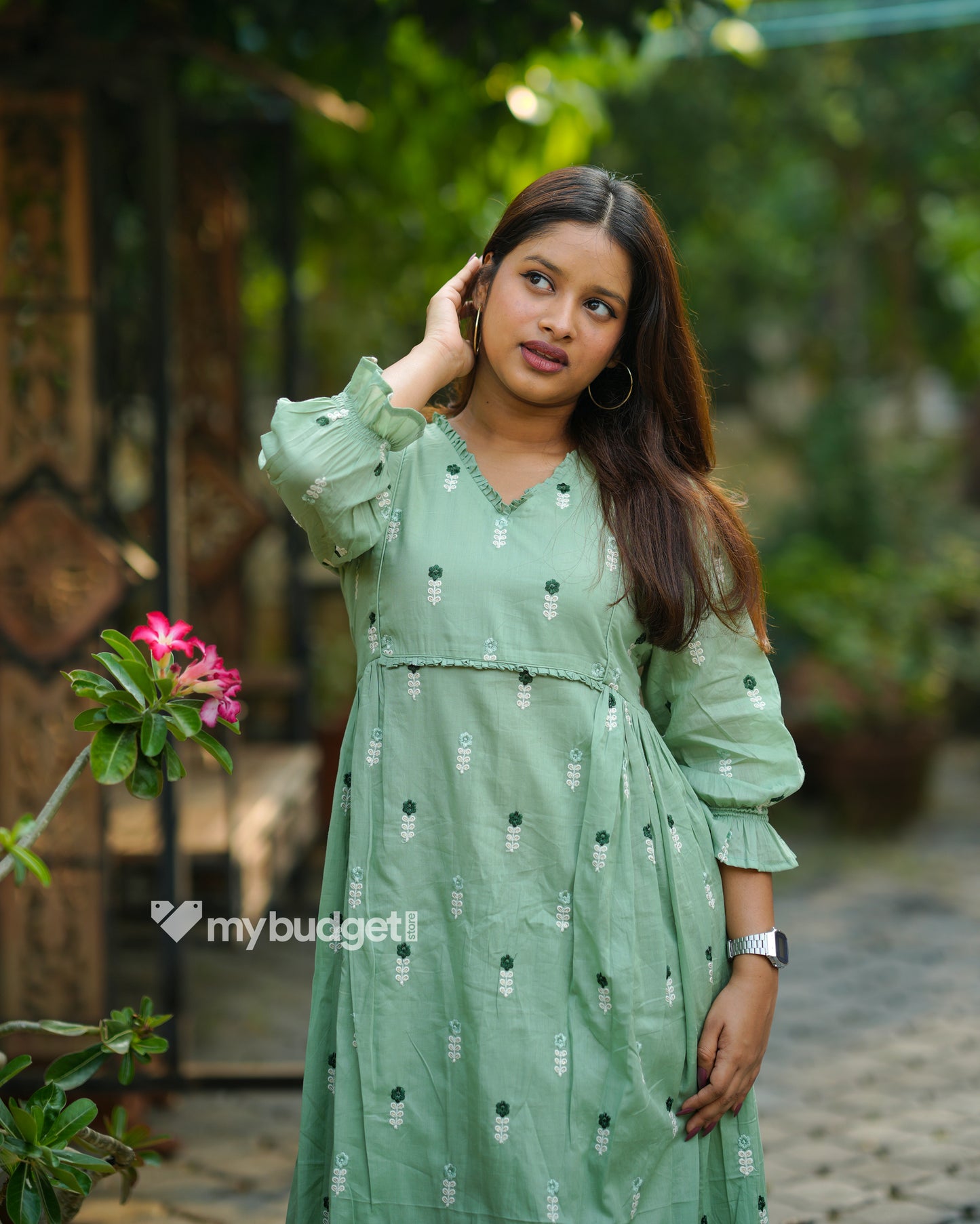 Green mul cotton Aline kurti with frills and all over floral embroidery MBS-1196