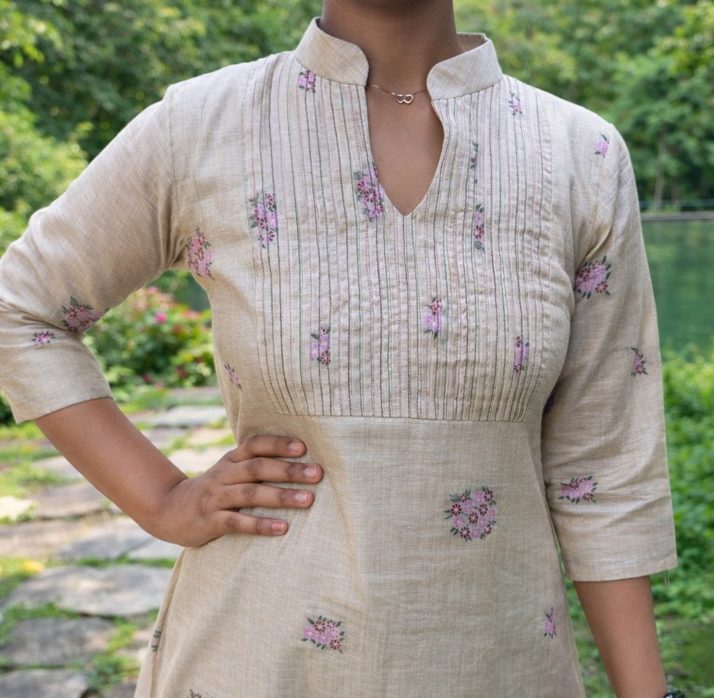 Cotton linen A-line kurti with all over floral jamdhani weaving and thread detailed pleats on yoke in beige shade MBS-846 ** Ready to dispatch**