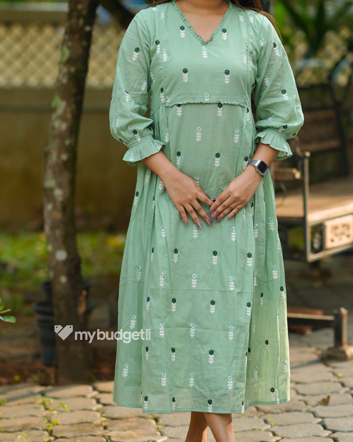 Green mul cotton Aline kurti with frills and all over floral embroidery MBS-1196