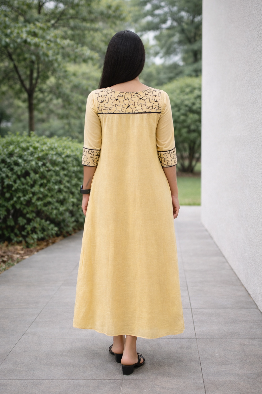Soft beige shaded viscose mul chanderi A-line kurti with black floral thread embroidered yoke MBS-841 **Onam 26**
