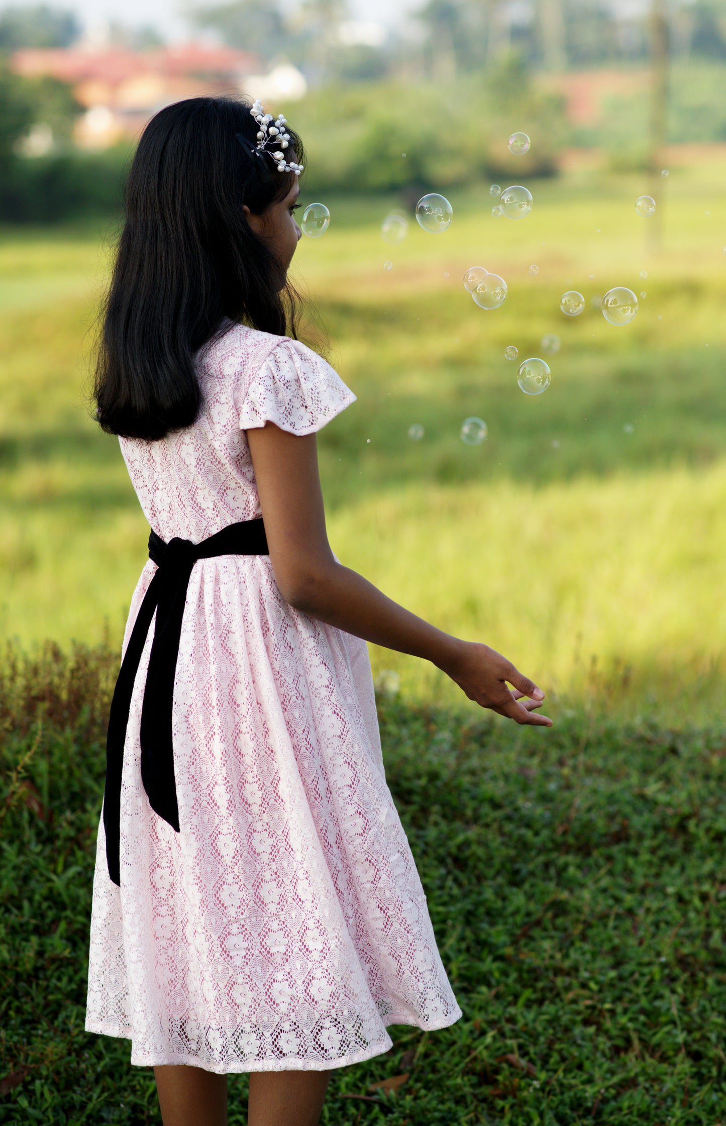 Kids lace frock in baby pink shade