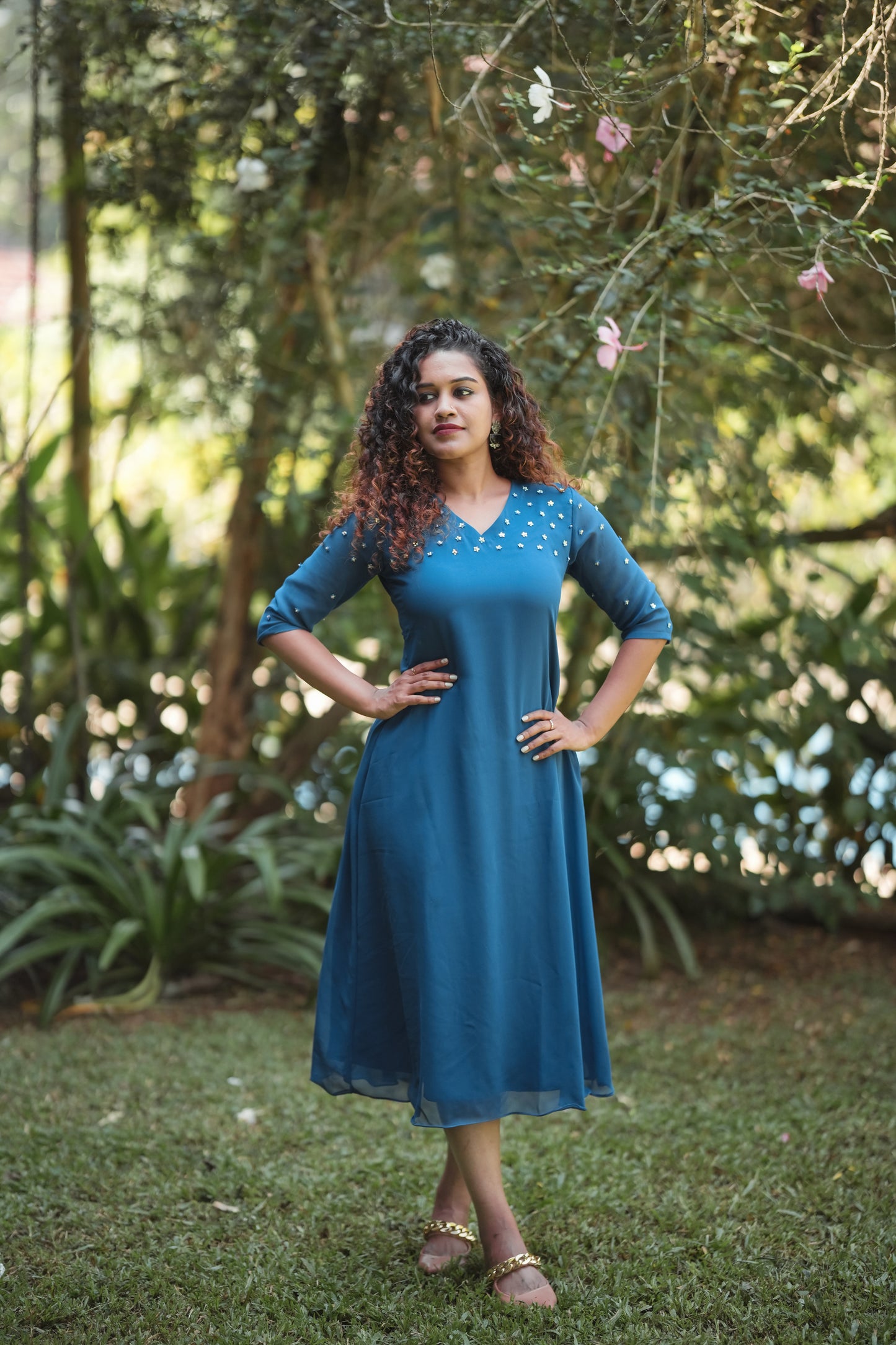 Ruby blue georgette aline kurti with handwork detailing on shoulder and sleeves