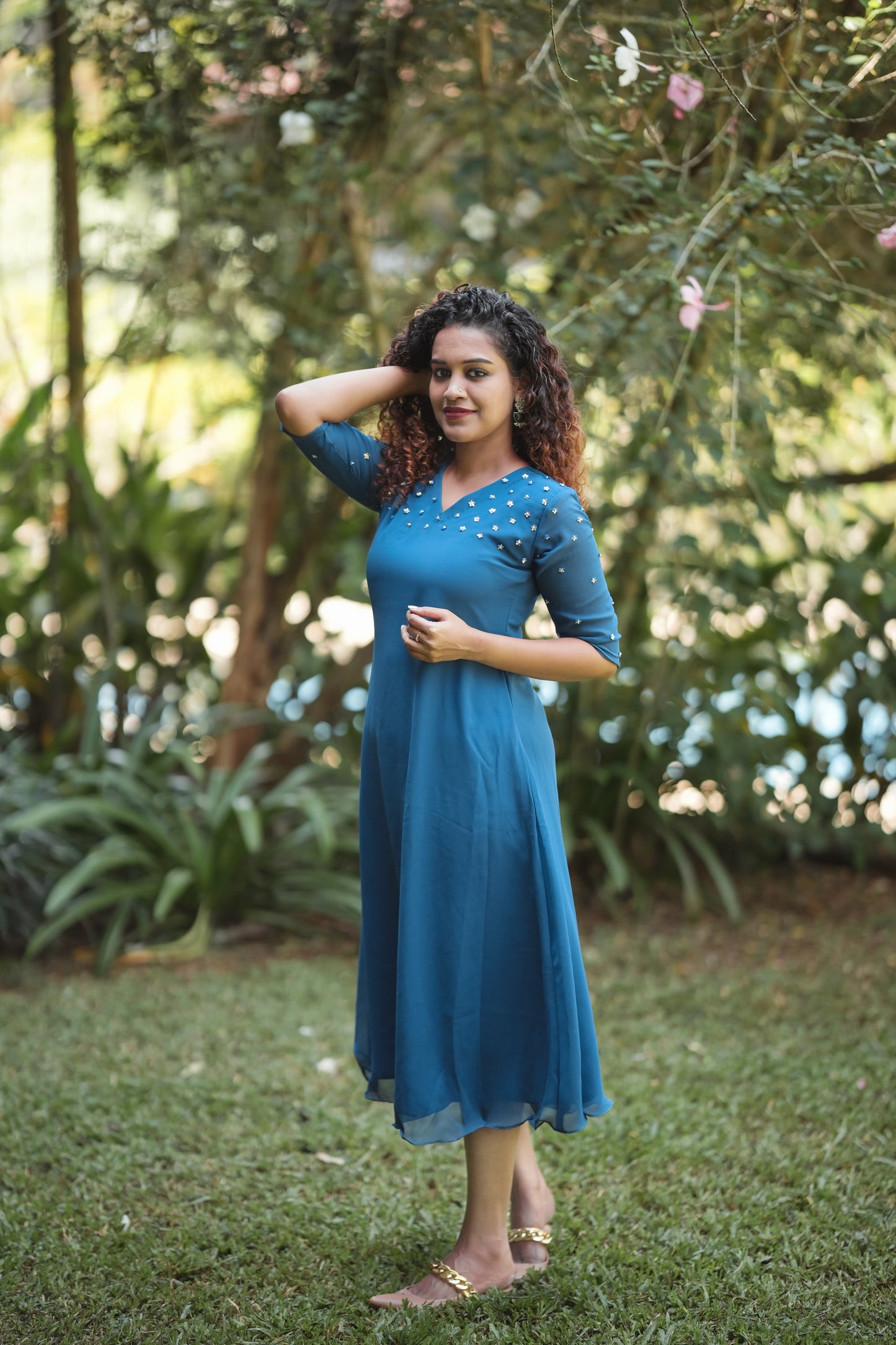 Ruby blue georgette aline kurti with handwork detailing on shoulder and sleeves