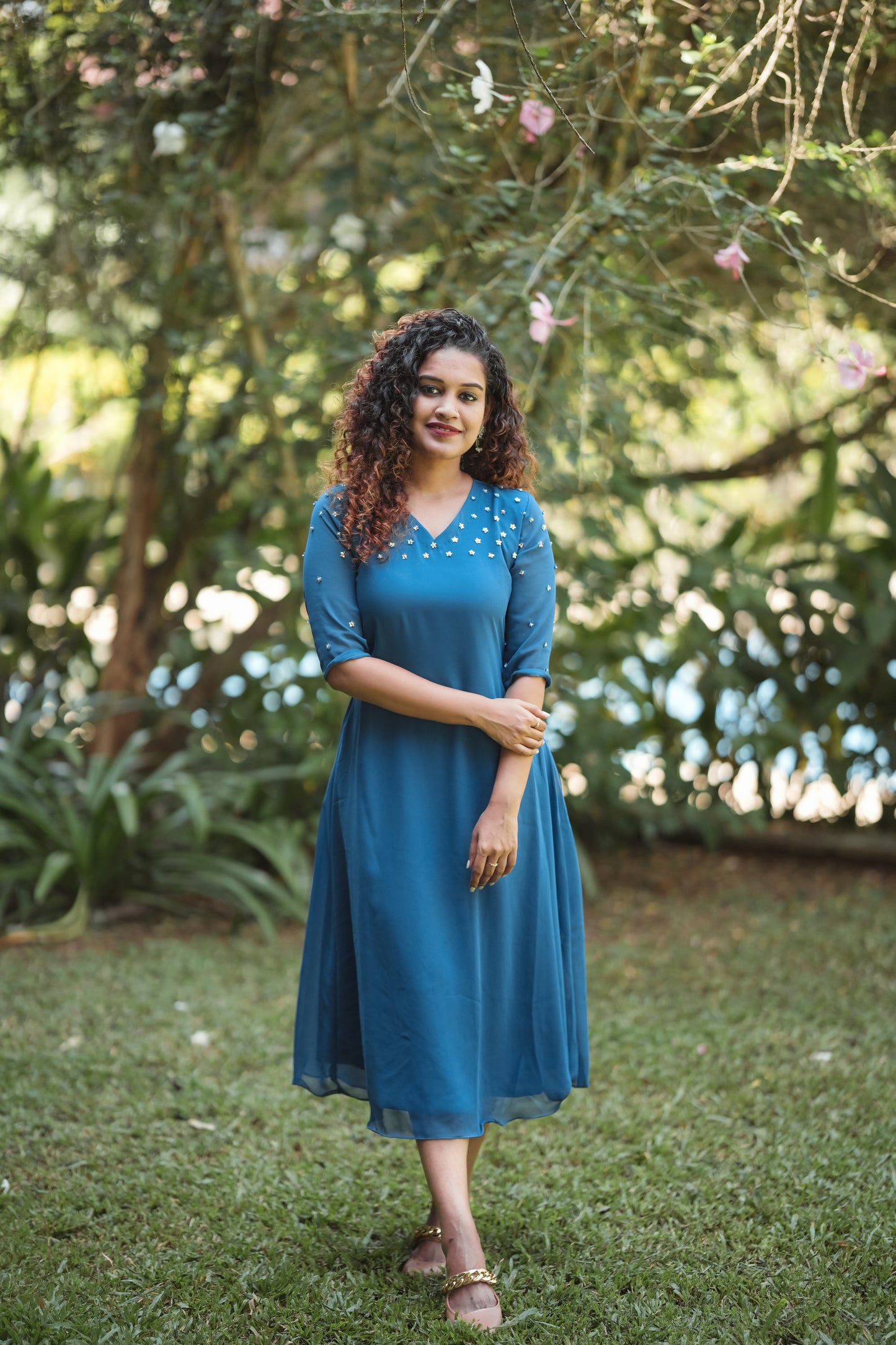 Ruby blue georgette aline kurti with handwork detailing on shoulder and sleeves