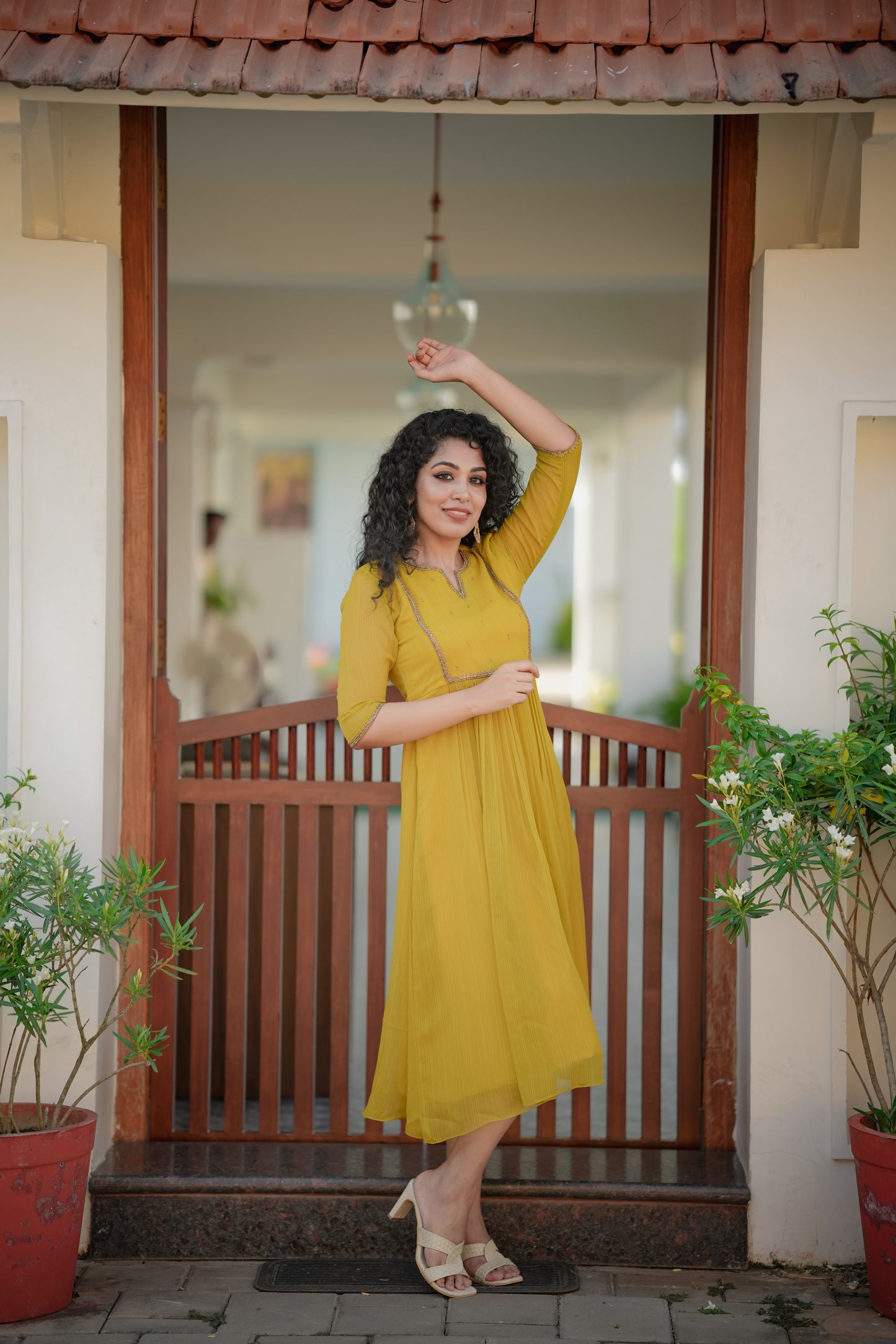 Yellowish green self lined georgette Aline kurti with handworked yoke and gathers