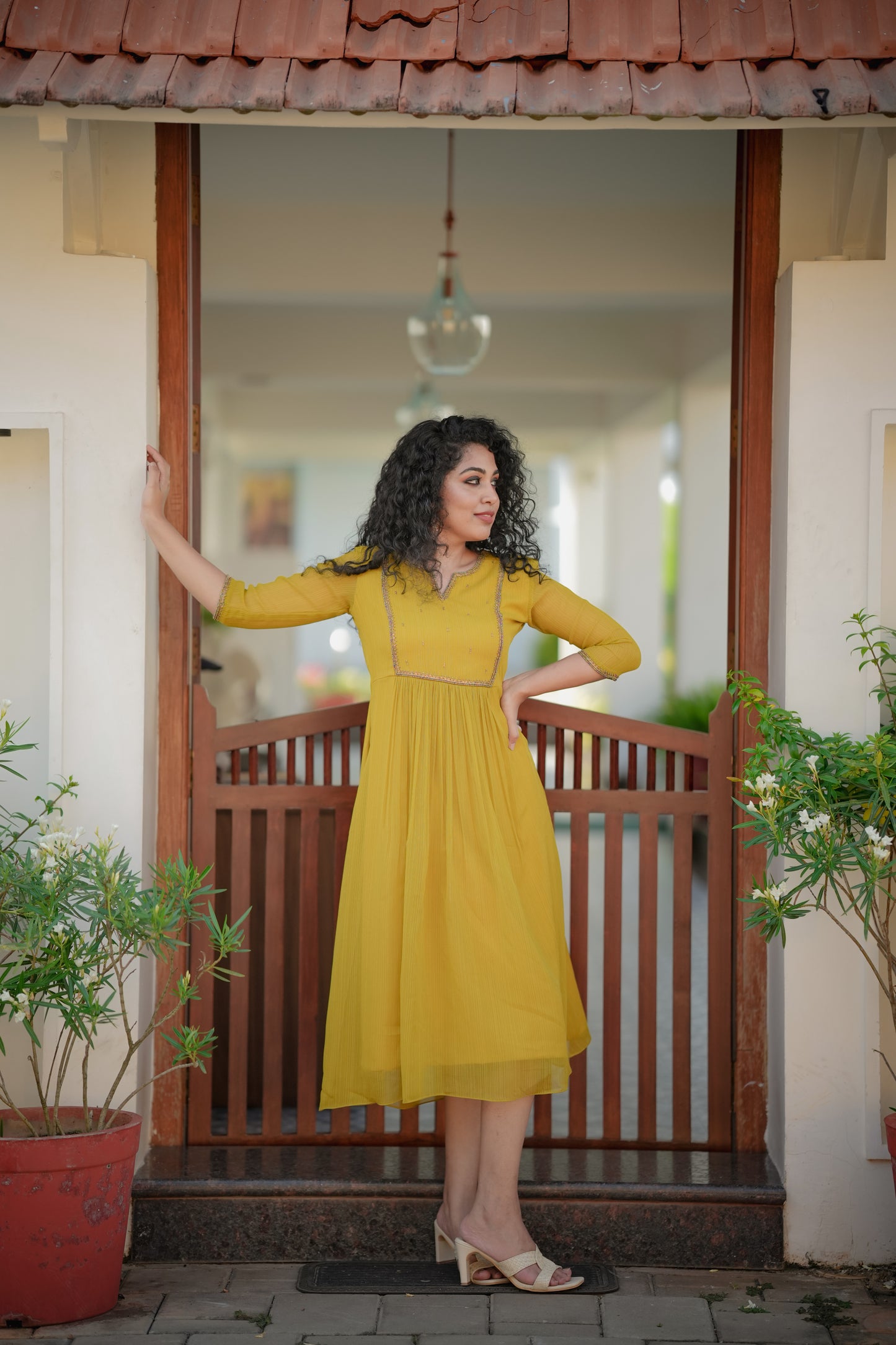 Yellowish green self lined georgette Aline kurti with handworked yoke and gathers