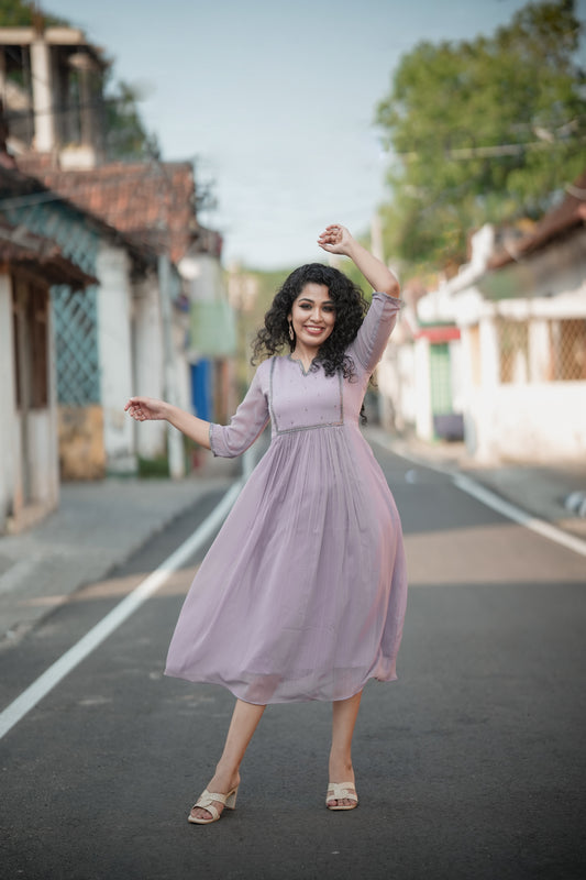 Lavender shaded self lined georgette Aline kurti with handworked yoke and gathers