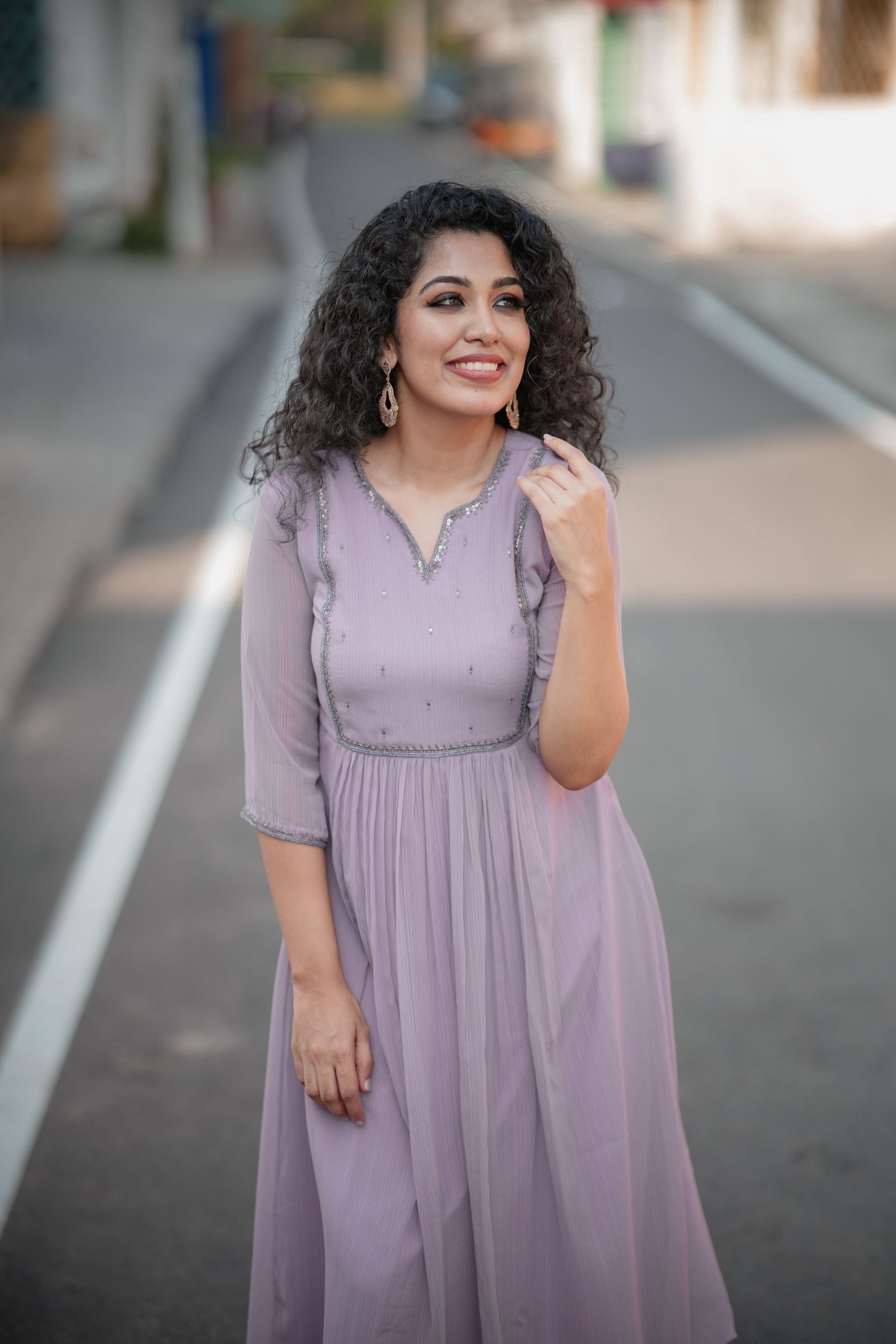 Lavender shaded self lined georgette Aline kurti with handworked yoke 