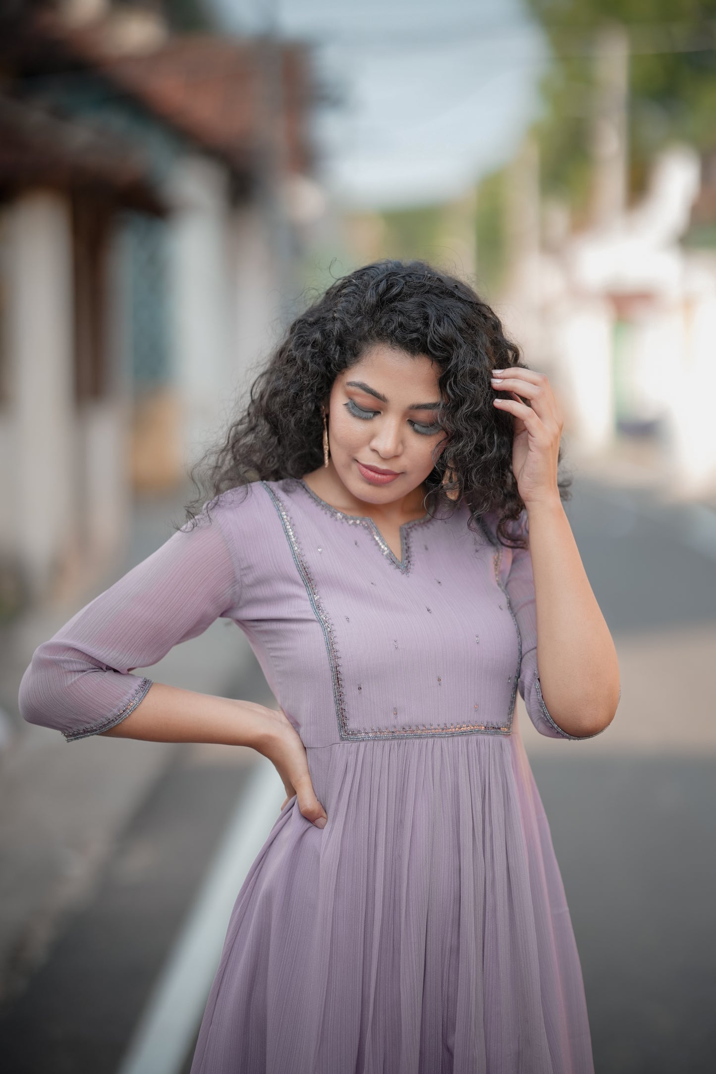 Lavender shaded self lined georgette Aline kurti with handworked yoke 